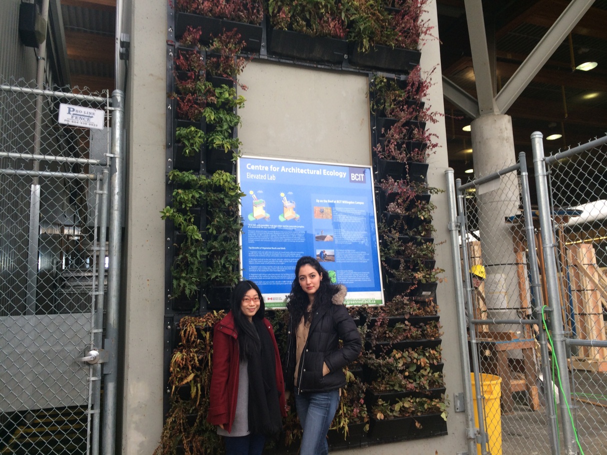 From left to right – Rosa Lin and Mahsa Akbarnejad, Masters of Applied Science in Building Science students at BCIT stand in front of the Burnaby Campus’s new Elevated Lab Living Wall.