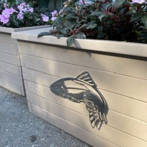 Images of the planters and the metal fish.