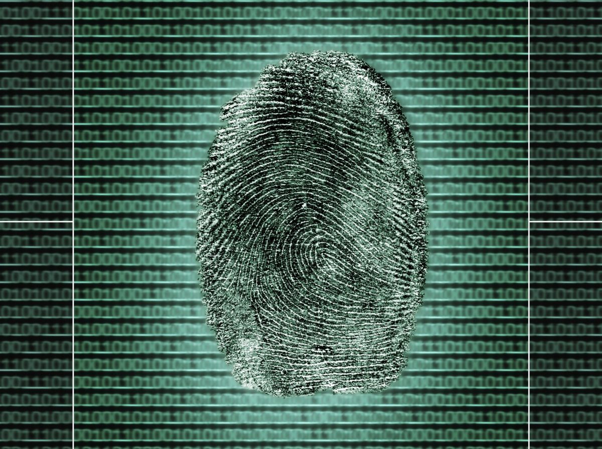 human fingerprint overlaid on computer code