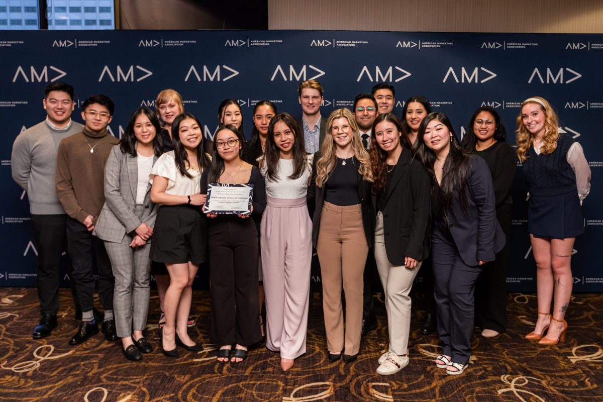BCIT Marketing students are standing for a group photo at the American Marketing Association International Collegiate Conference.