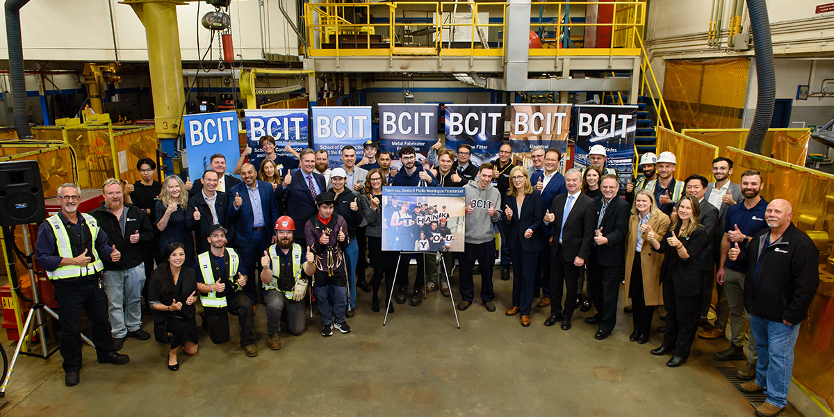Group of donors, BCIT staff and faculty, government, students smiling with thumbs up