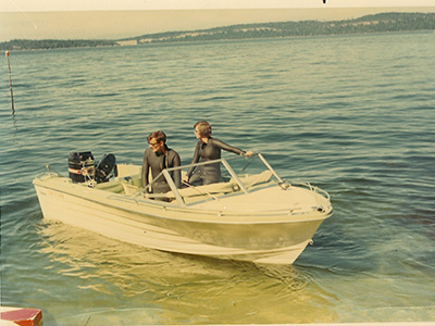 Vintage photo of Peggy Waldbauer and her husband Jim on a boat in the water