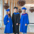 Three graduating students in regalia
